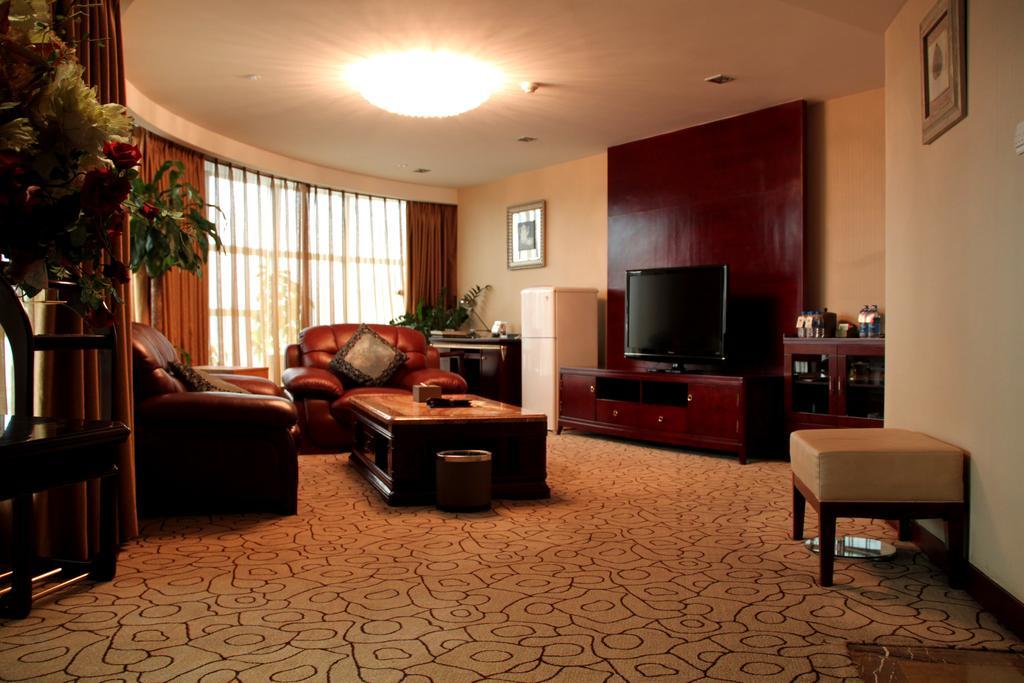 Dynasty International Hotel Kunming Quarto foto
