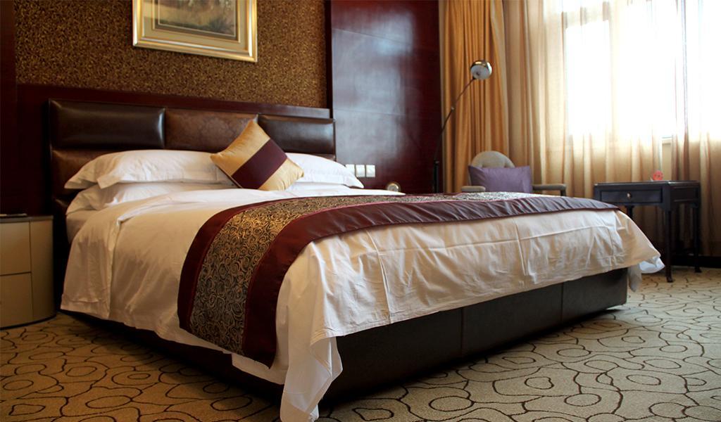 Dynasty International Hotel Kunming Quarto foto