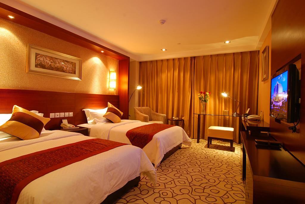 Dynasty International Hotel Kunming Quarto foto