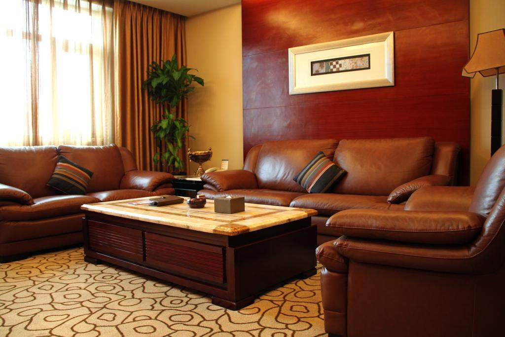 Dynasty International Hotel Kunming Quarto foto