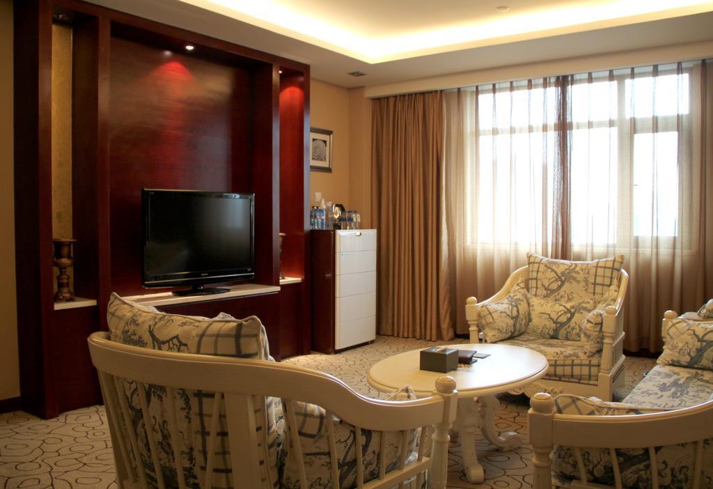 Dynasty International Hotel Kunming Quarto foto